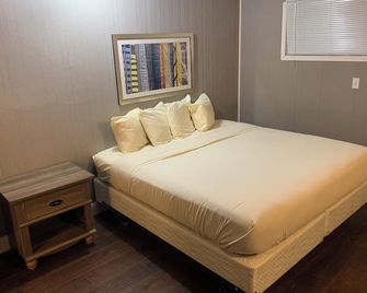 Sawmill Lodges Motel - Hennessey - Habitación