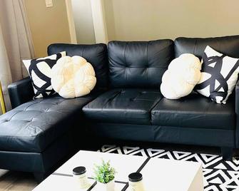 Welcome to our charming two-bedroom retreat nestled in the heart of West Cleveland - Cleveland - Living room