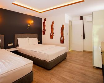 Keyif Pension & Aparts - צ'יראלי - חדר שינה