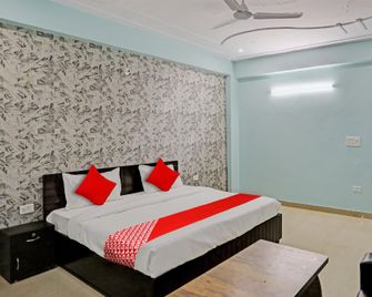 OYO Flagship Hotel Umen - Noida - Schlafzimmer