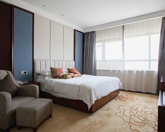 Zhonghui International Conference Center - Xuzhou - Schlafzimmer
