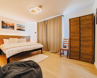 Albert Residence Grand Chalet With Optional Spa Access Included - Poiana Brașov - Bedroom