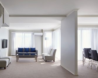 Pinnacle Apartments - Kingston - Living room