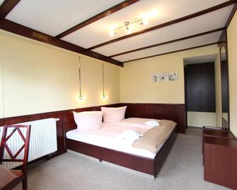 هوتل ريستورانت دريسدين دوميزيل - درسدين - غرفة نوم