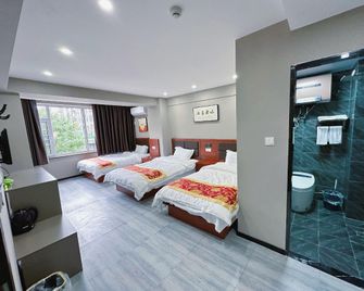 Haozailai Business Hotel (Little Potala Palace Branch) - Jinzhou - Camera da letto