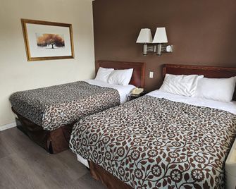 Travel Inn By OYO Omaha - אומהה - חדר שינה