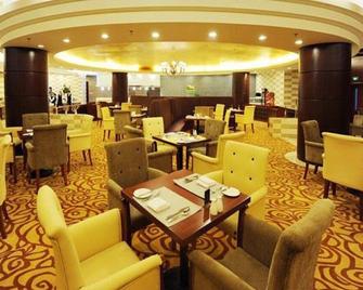 Beijing Jingyi Hotel - בייג'ין - מסעדה