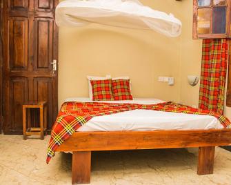 Featuring free WiFi, Rooftop Cafe , close to ferry terminal & City attractions - Zanzibar - Bedroom