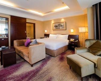 Friendship Hotel - Фушунь - Спальня