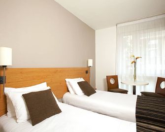 Séjours & Affaires Paris Ivry - Ivry sobre Sena - Habitación