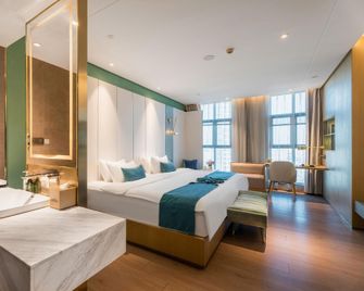 Mehood Lestie Hotel Yancheng North Station Aegean Shopping Park Branch - Yancheng - Bedroom