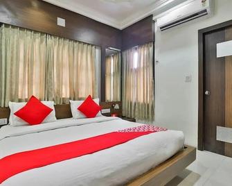 Hotel City Palace - Dwārka - Bedroom