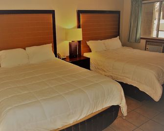 Edgewater Inn - Sylvan Lake - Schlafzimmer