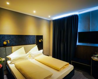 Hotel Am Schloss Biebrich - ויסבאדן - חדר שינה