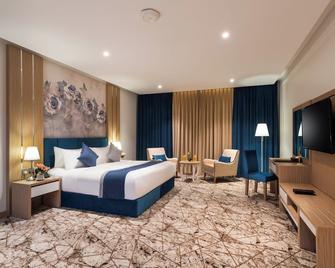Le Park Concord Hotel Baish - Baish - Habitación