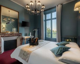 أوتل دو باري - ليموج - غرفة نوم