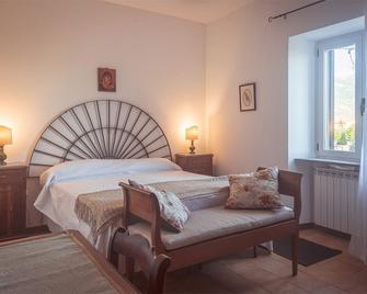 Farmhouse Querceto - Apartment Olive Tree - Mocaiana - Habitación