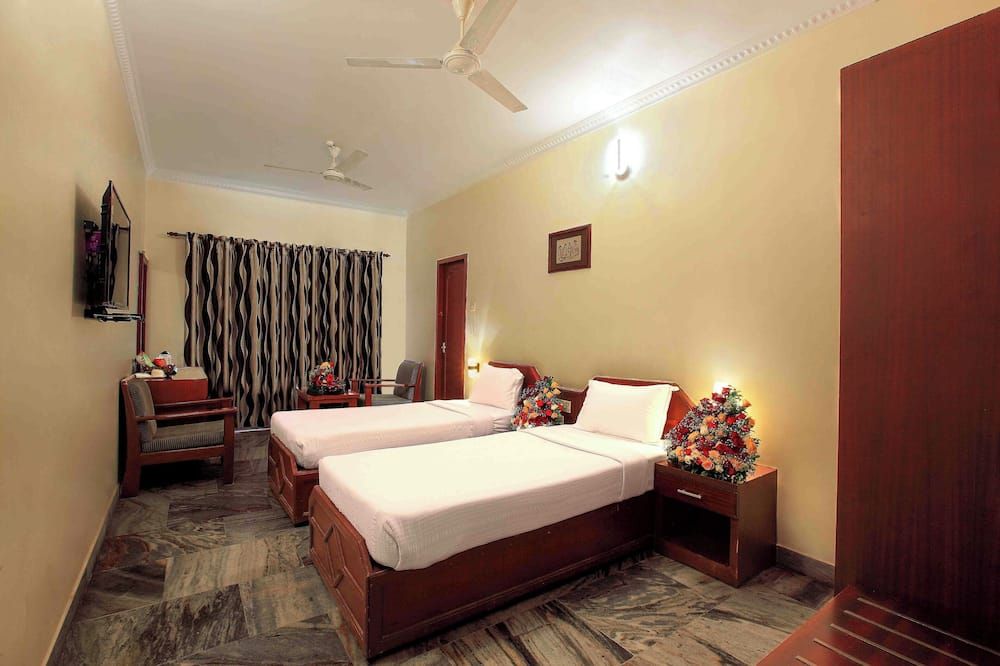Hotel Indraprastha Karunagapally - Kollam - Camera da letto