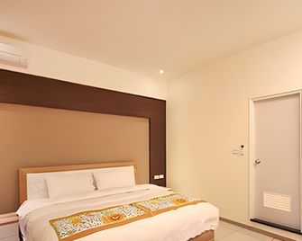 Yongyong Home and Breakfast - Jincheng Township - Bedroom