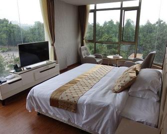 8090 Hotel - Zhangzhou - Schlafzimmer