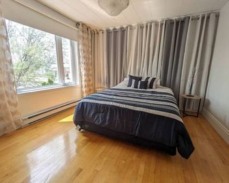 Le Cocon du Rivage - Roberval - Bedroom