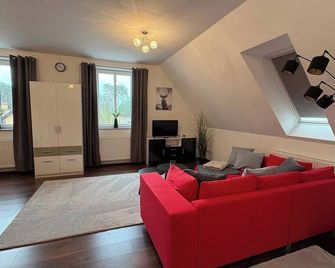 Haus am Röblinsee - Ferienwohnungen in Fürstenberg - Fürstenberg/Havel - Вітальня