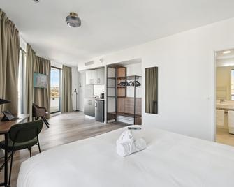 All Suites Appart Hôtel - Paris Ouest - Colombes - Colombes - Schlafzimmer
