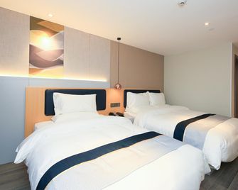 Home Inn (Fuzhou Bayi 7th Road Sanfang Qixiang) - Фужоу - Спальня