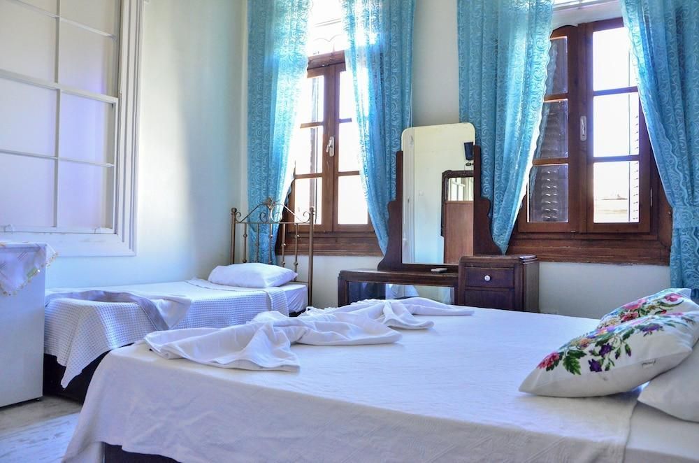 Zeynep Hanim Konukevi - ايفاليك - غرفة نوم