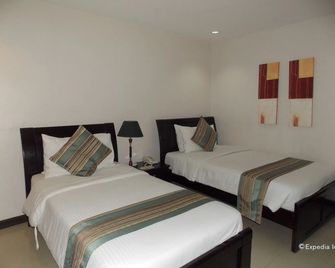 The Suites at Calle Nueva - Bacolod - Soveværelse