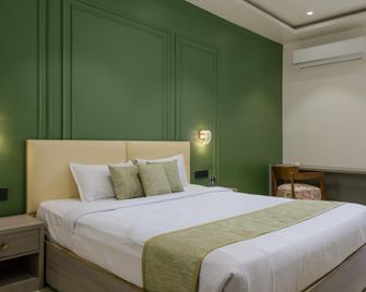 The Grand Neelam Hotel - Raipur - Slaapkamer