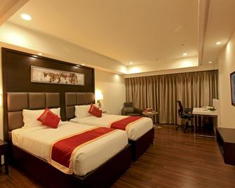 Goutham Grand Hotel - Tenali - Bedroom