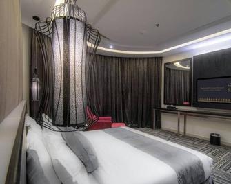 South Hotel Apartments - Khamis Mushait - Bedroom