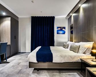 The District Hotel - סנט ג'וליאנס - חדר שינה