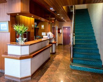 Hotel Churchill - Genève - Receptionist