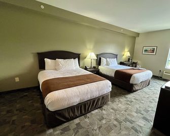 Midland Inn & Suites - Midland - Schlafzimmer