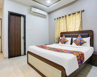 Fabhotel Johar Inn - Raipur - Slaapkamer