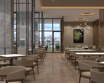 Harris Hotel & Suites Nagoya Batam - Batam - Restaurant