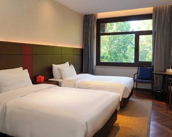 Ziyue Minghu Hotel - Jinan - Schlafzimmer