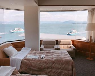 مياجيما كورال هوتل - هاتسوكايتشي - غرفة نوم