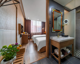 James Joyce Coffetel Wuxi Taihu Square Subway Station Branch - Wuxi - Bedroom