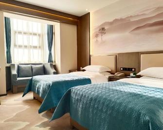 Lanzhou Hualian Hotel - Lanzhou - Schlafzimmer