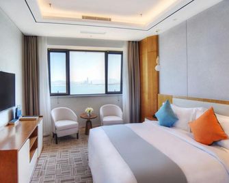 Blue Bay Resort Hotel - Yantai - Schlafzimmer
