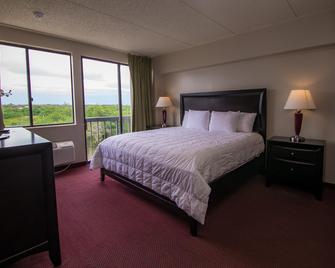 Port Labelle Inn & Conference Center - LaBelle - Schlafzimmer