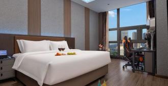 Yannian Shijia Hotel - Changsha - Schlafzimmer