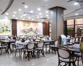 Master Porto Alegre Hotel - Av Carlos Gomes, Próximo ao Consulado Americano - Porto Alegre - Restaurante