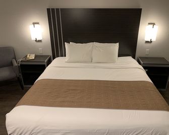 Sand Castle Inn - Seaside - Bedroom