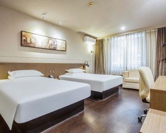 Jinjiang Inn Select Zhenjiang Wanda Plaza Xijindu - Zhenjiang - Ložnice