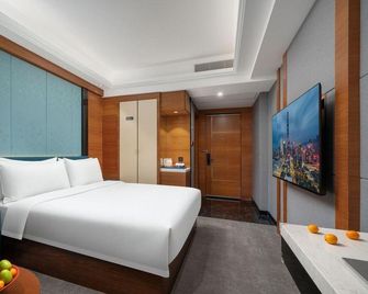 Huayi Hotel (Shenzhen North Railway Station 6979 Commercial Center) - Shenzhen - Schlafzimmer