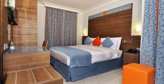 Benin Royal Hotel - Cotonou - Schlafzimmer